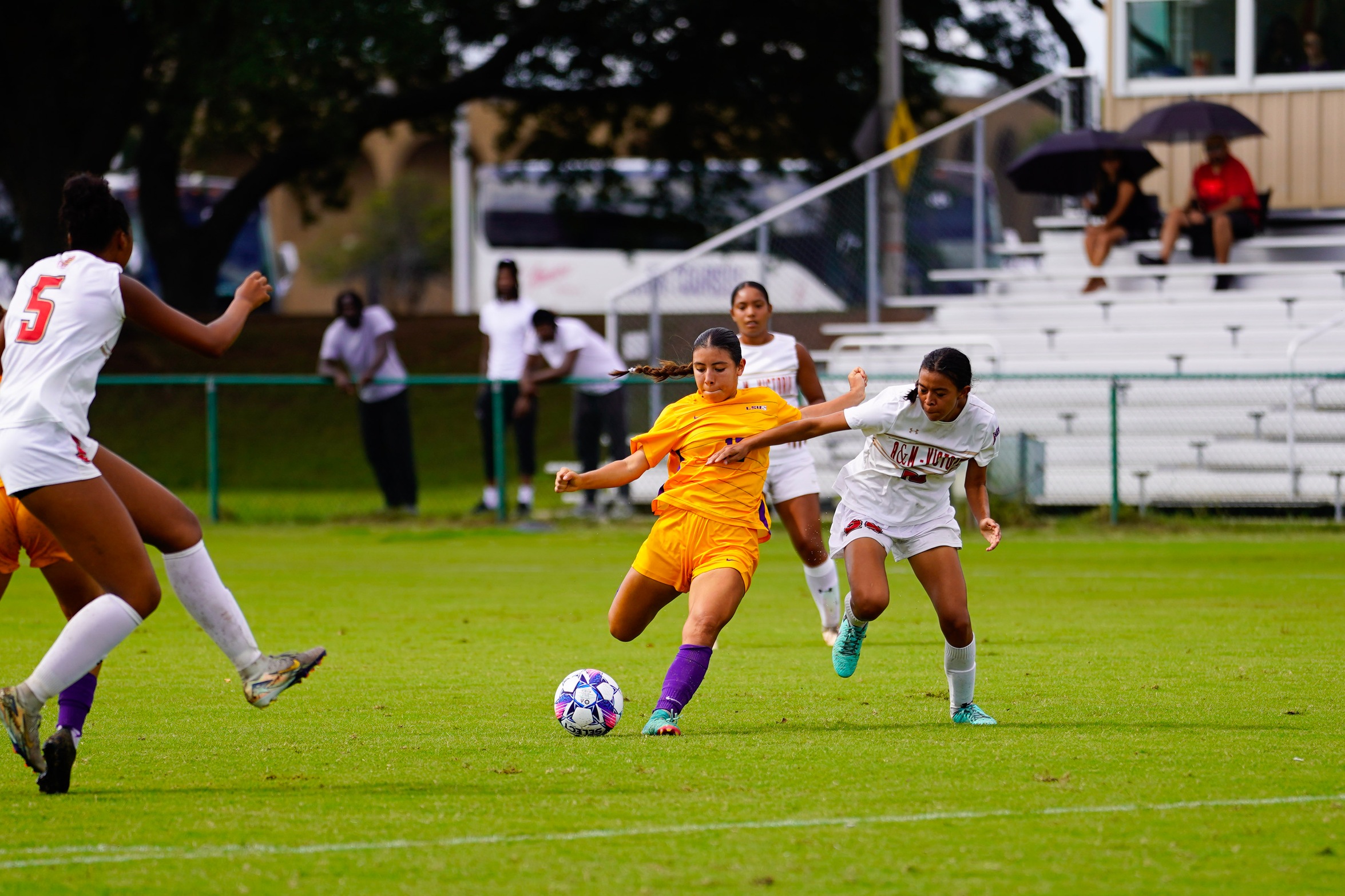 Ashlin Fuentes on the dribble against Texas A&M-Victoria. Photo Credit: Jonathan Plaza