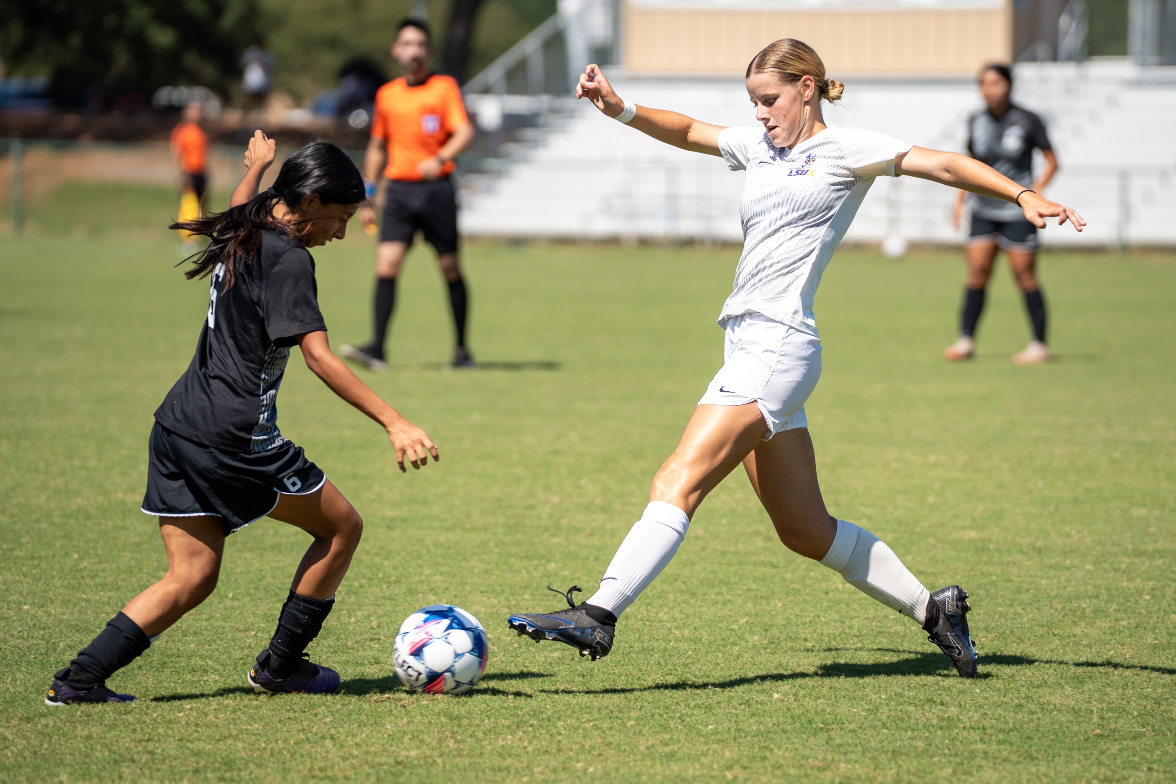 Jade Derks facing up against a North American defender. Photo Credit: Gracie Youngblood